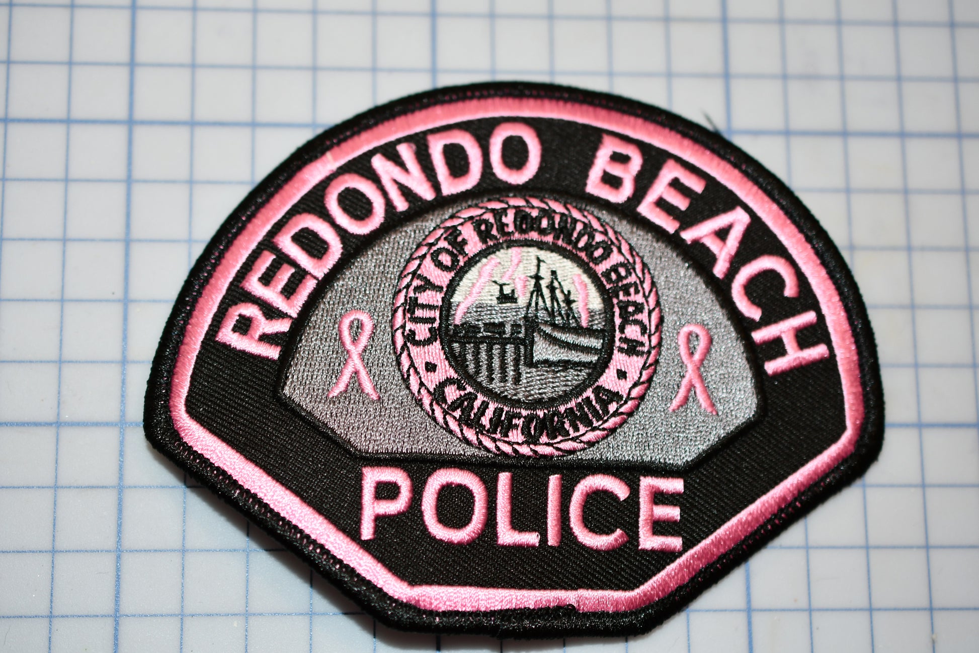 a patch that says redond beach police