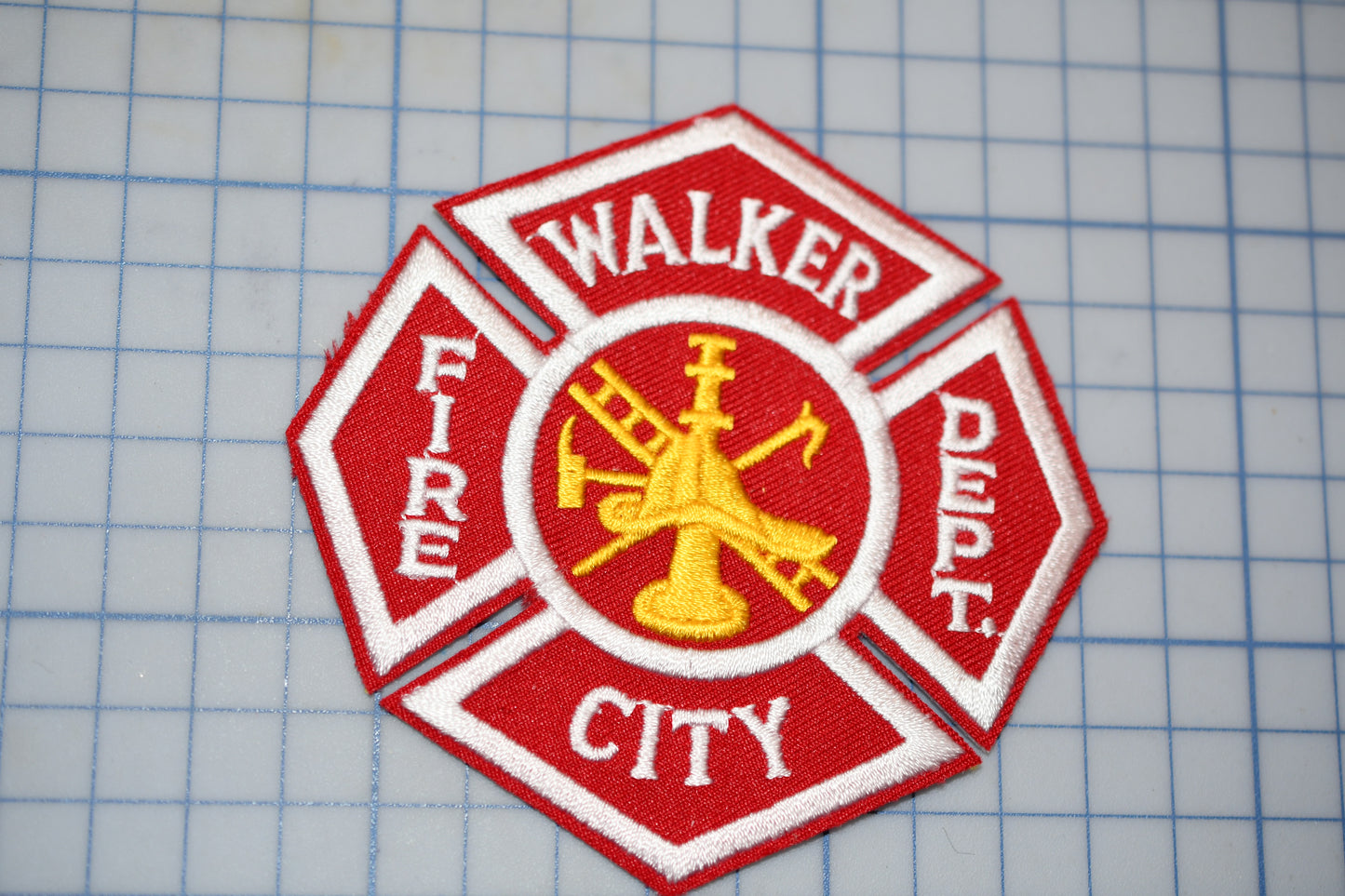 a patch with a fire department emblem on it