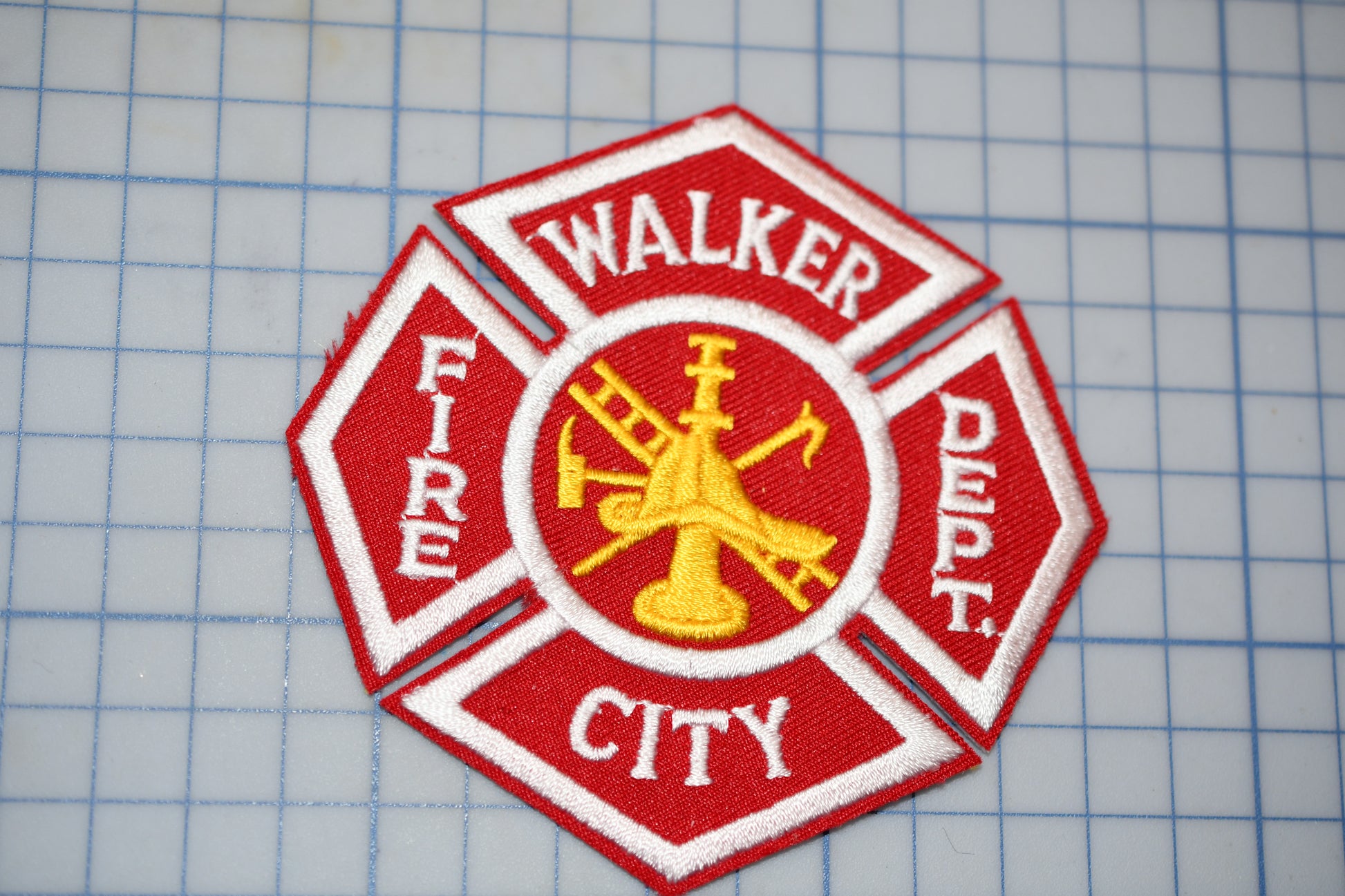 a patch with a fire department emblem on it