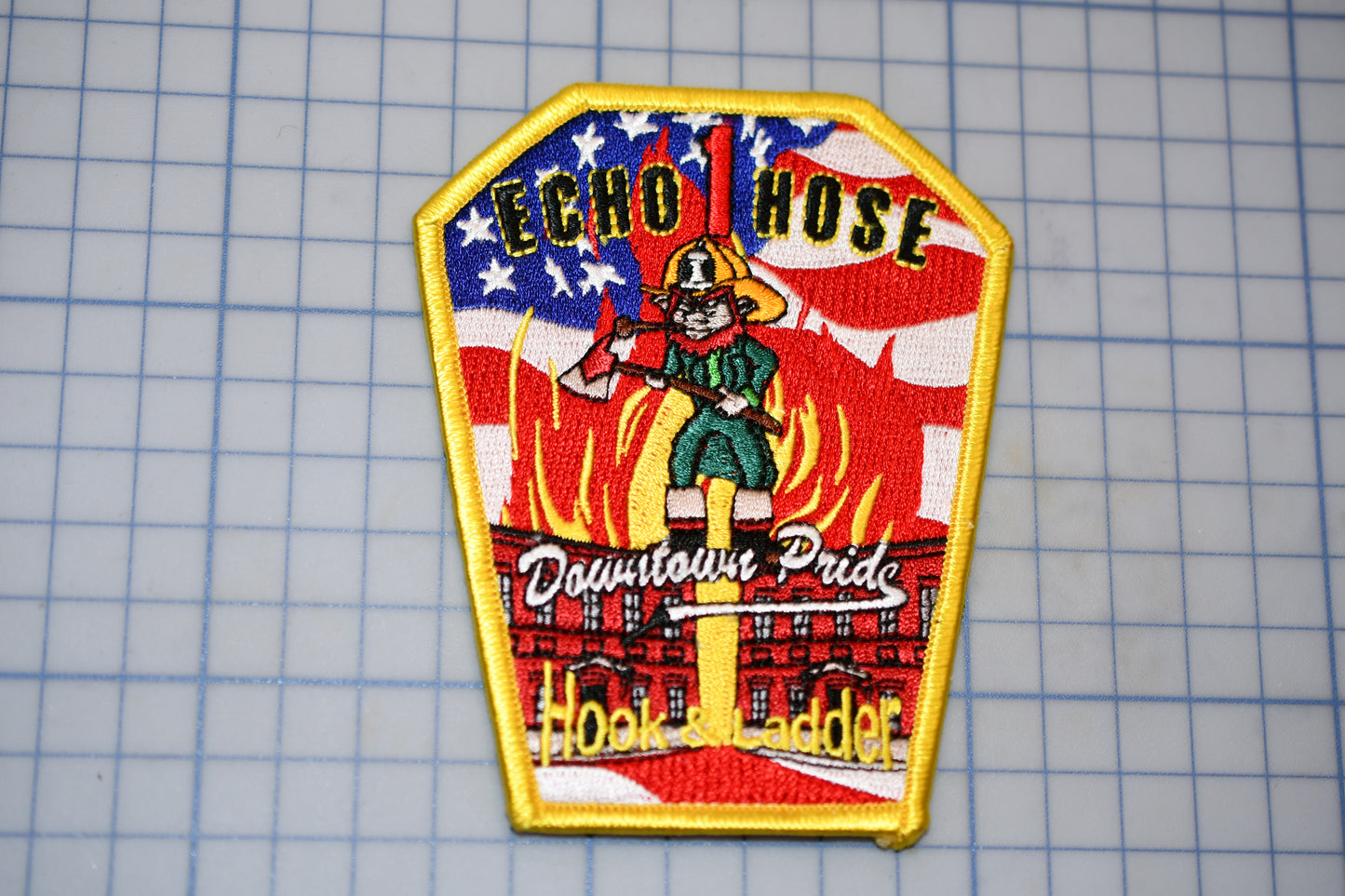 a patch with a picture of a fireman on it