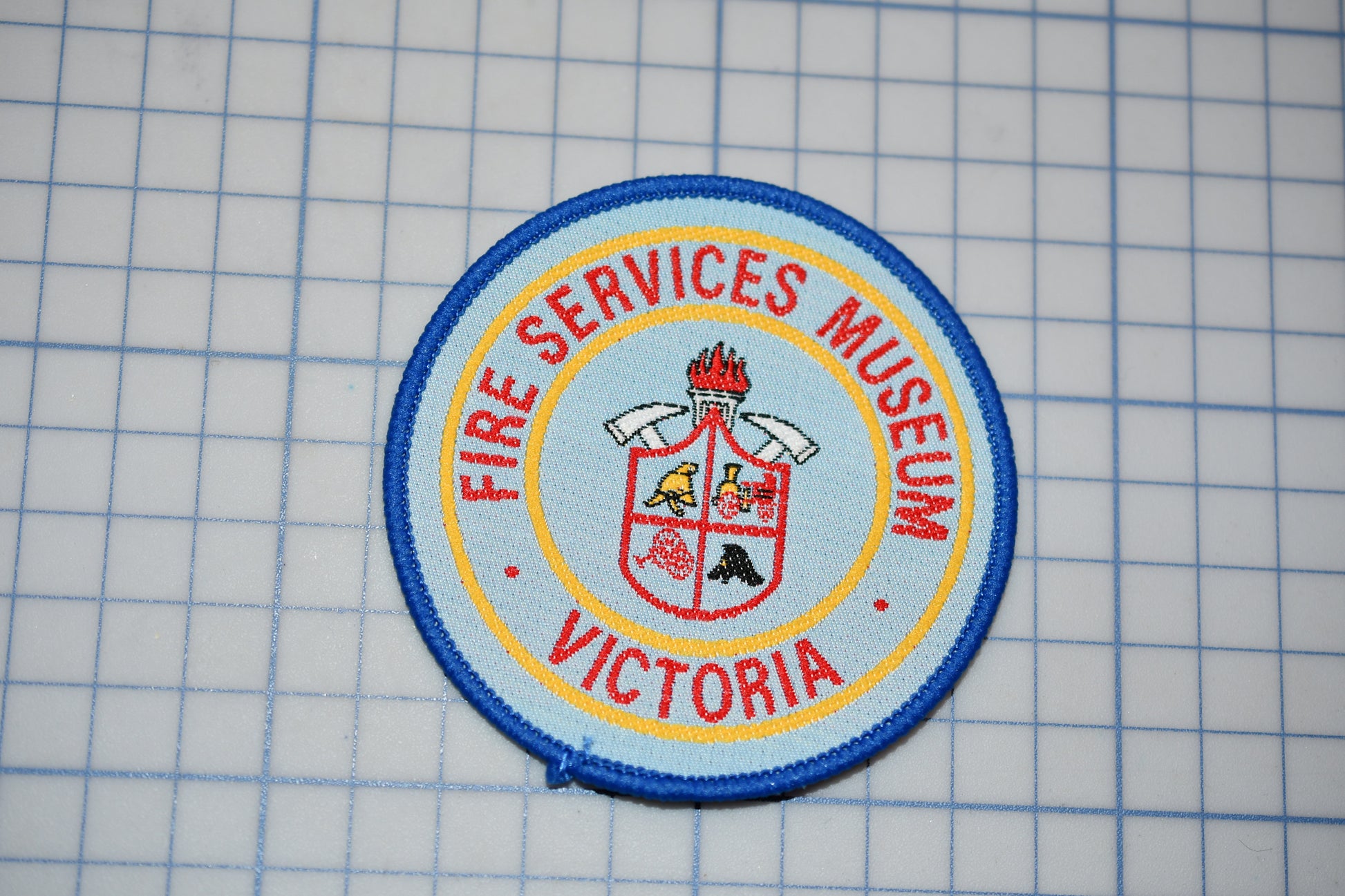 a patch with the words fire services museum victoria on it