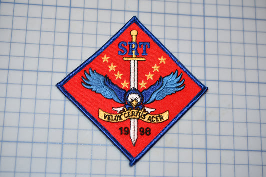 a patch with a sword and eagle on it