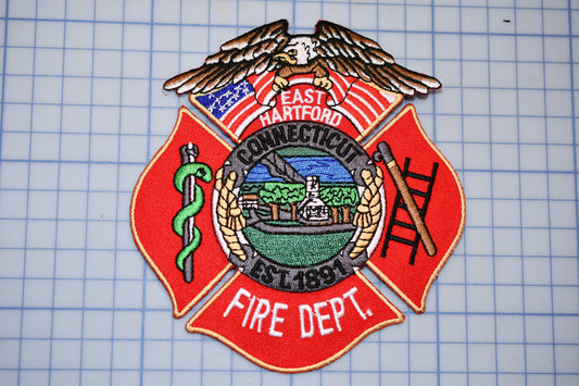 a patch with a fire department emblem on it