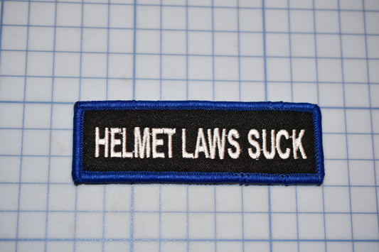 A &quot;Helmet Laws Suck&quot; Sew On Biker Patch (B30-366)