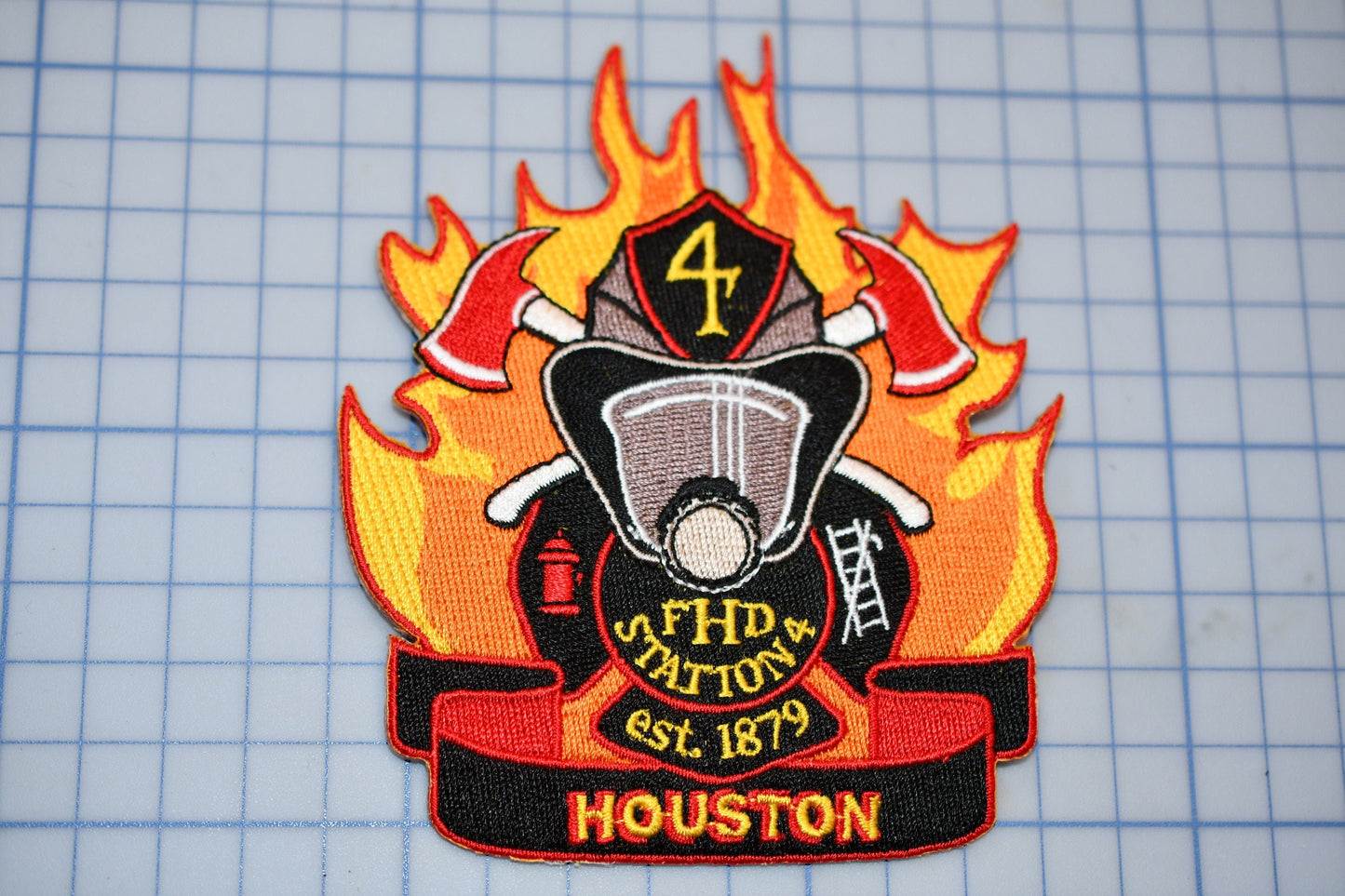 a patch with a firefighter&#39;s helmet on it