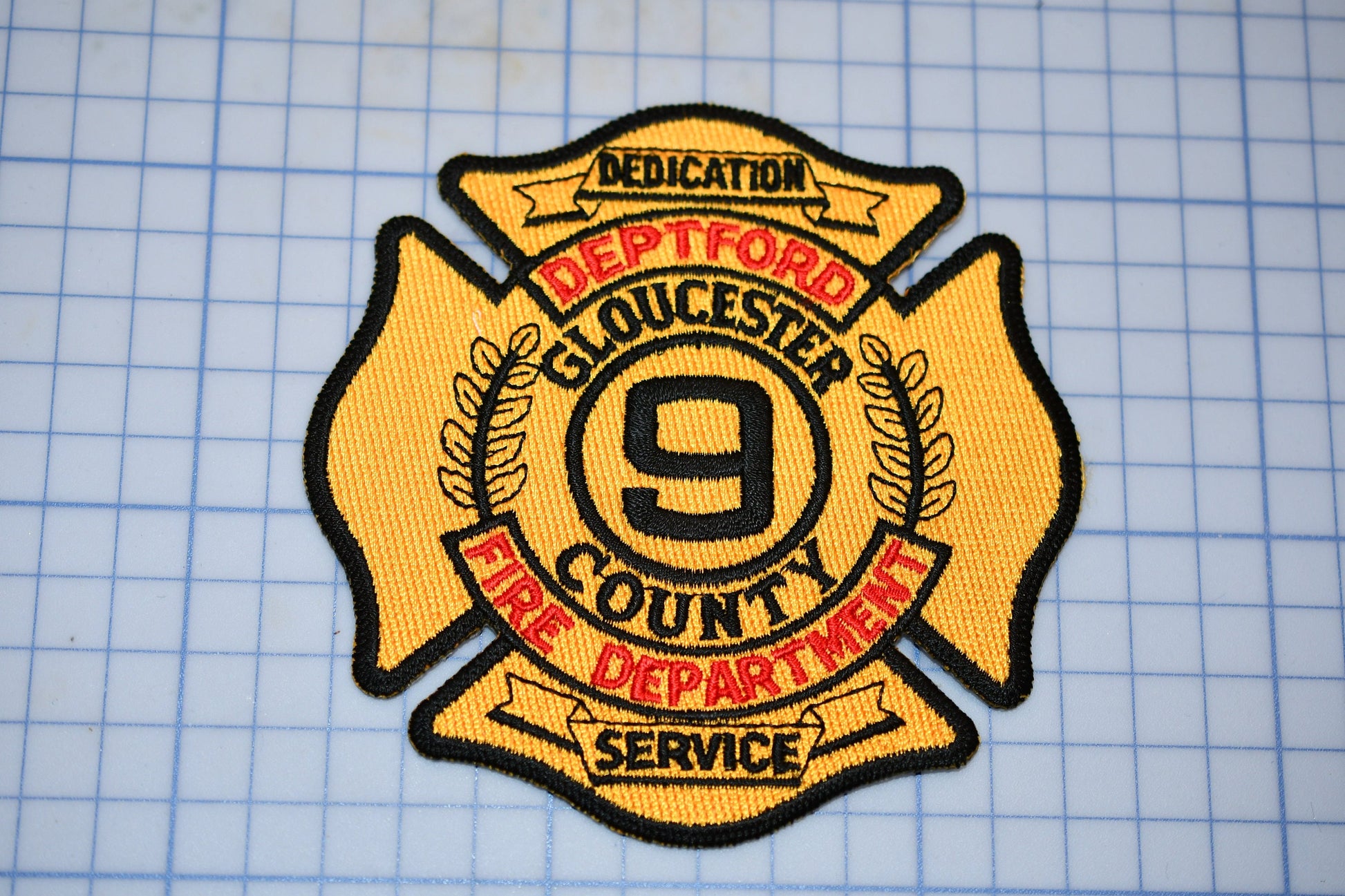 a patch with a fire department logo on it