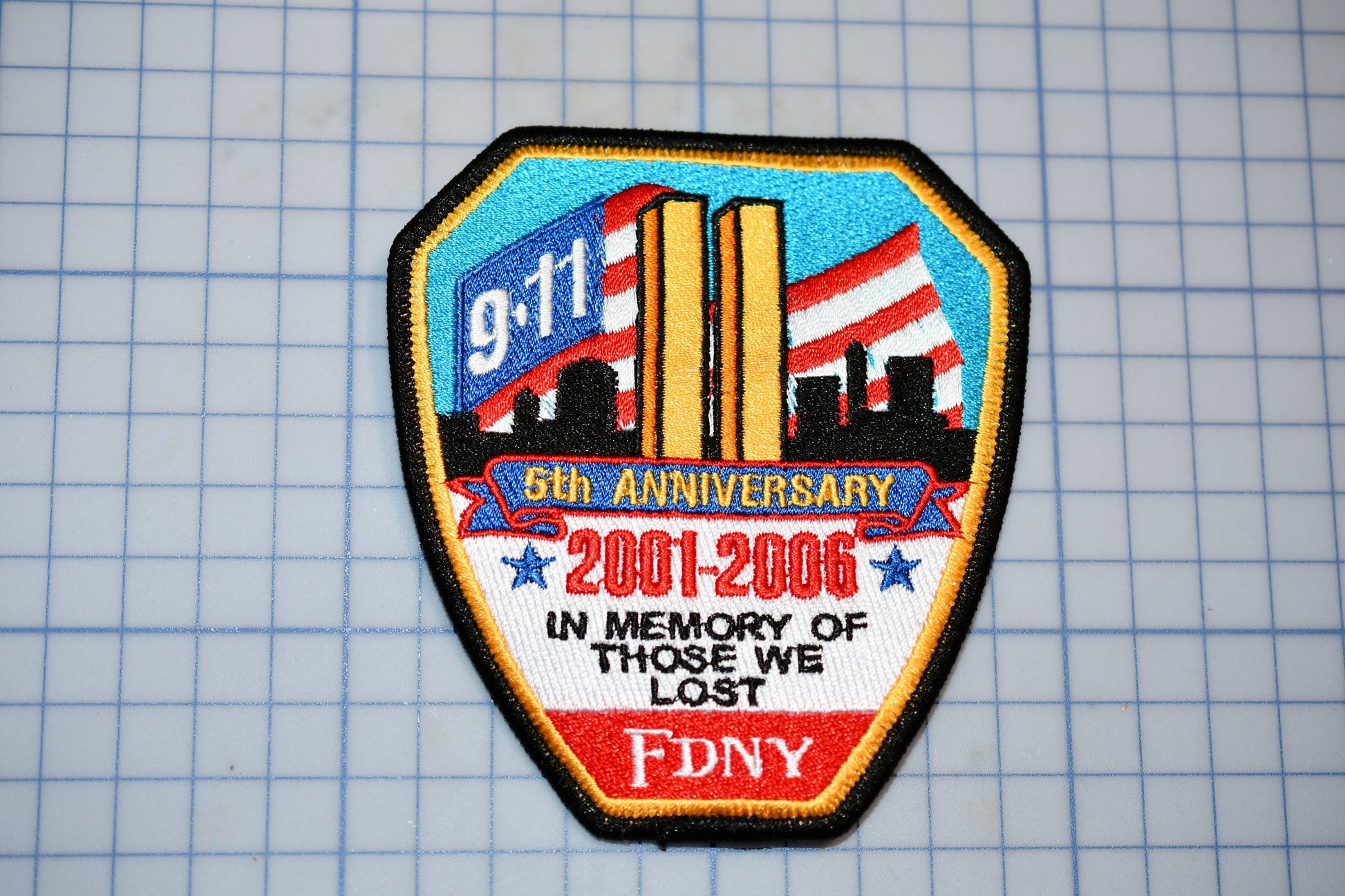 a patch with a picture of a city in memory of those we lost